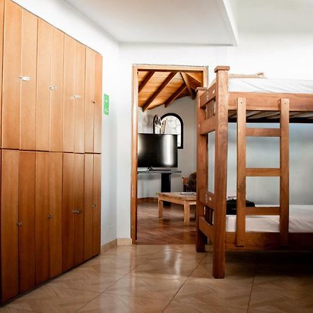 Happy Buddha Hostel & Lodge Guatape Bagian luar foto