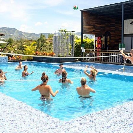 Happy Buddha Hostel & Lodge Guatape Bagian luar foto