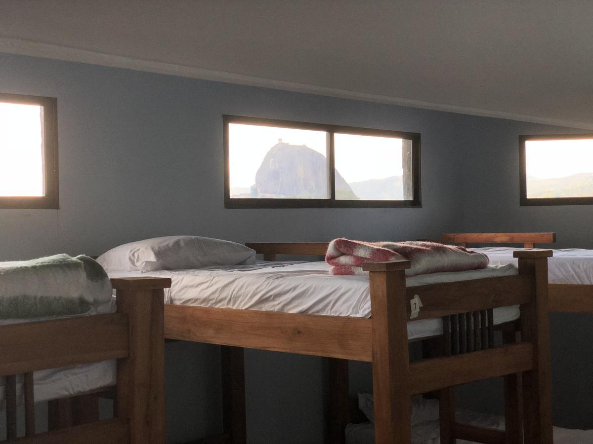 Happy Buddha Hostel & Lodge Guatape Bagian luar foto