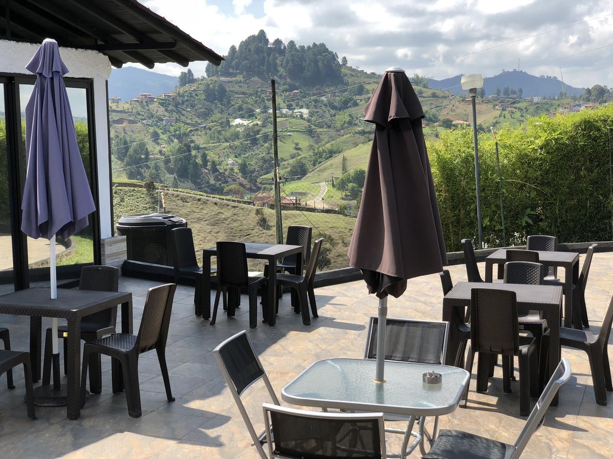 Happy Buddha Hostel & Lodge Guatape Bagian luar foto