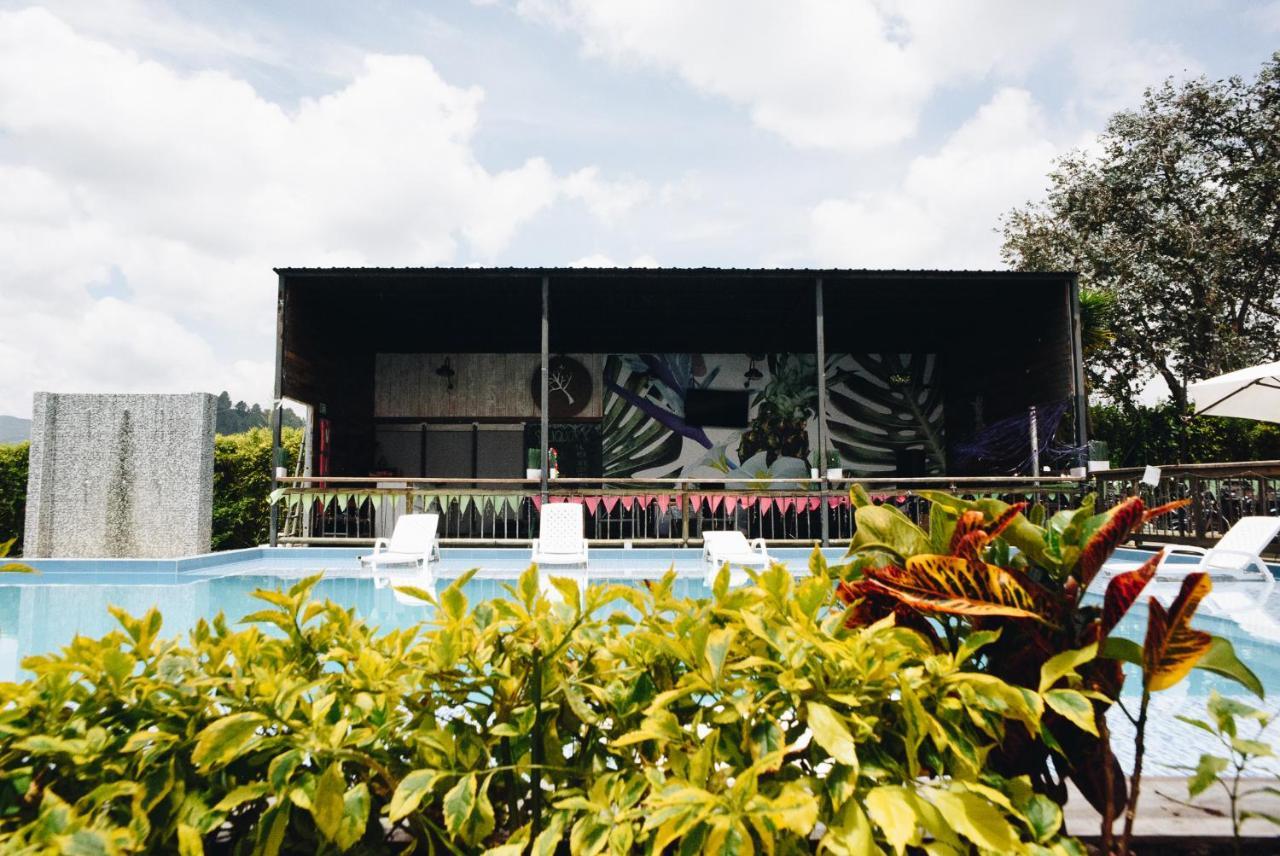 Happy Buddha Hostel & Lodge Guatape Bagian luar foto