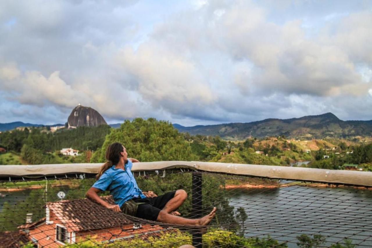 Happy Buddha Hostel & Lodge Guatape Bagian luar foto