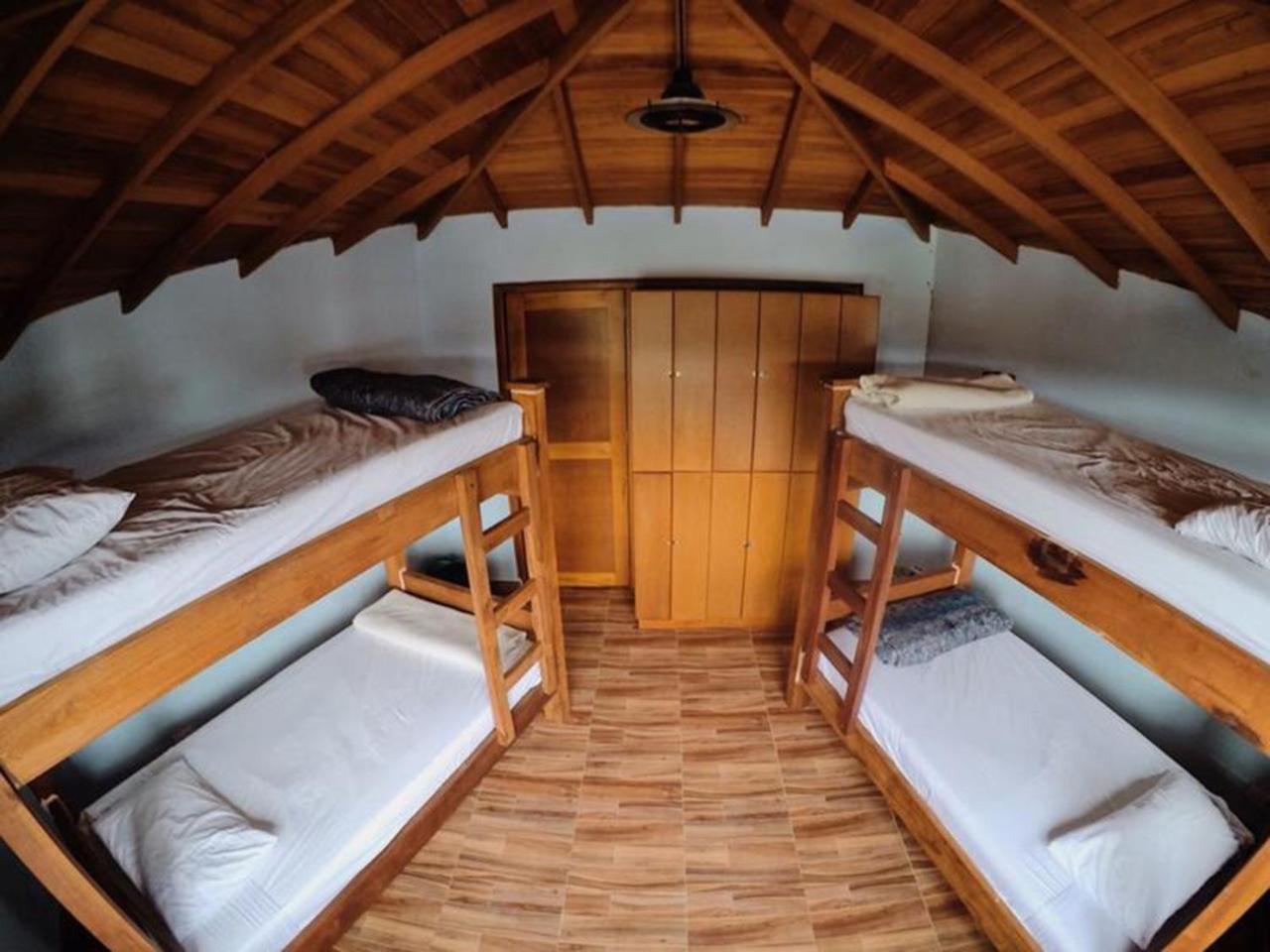 Happy Buddha Hostel & Lodge Guatape Bagian luar foto