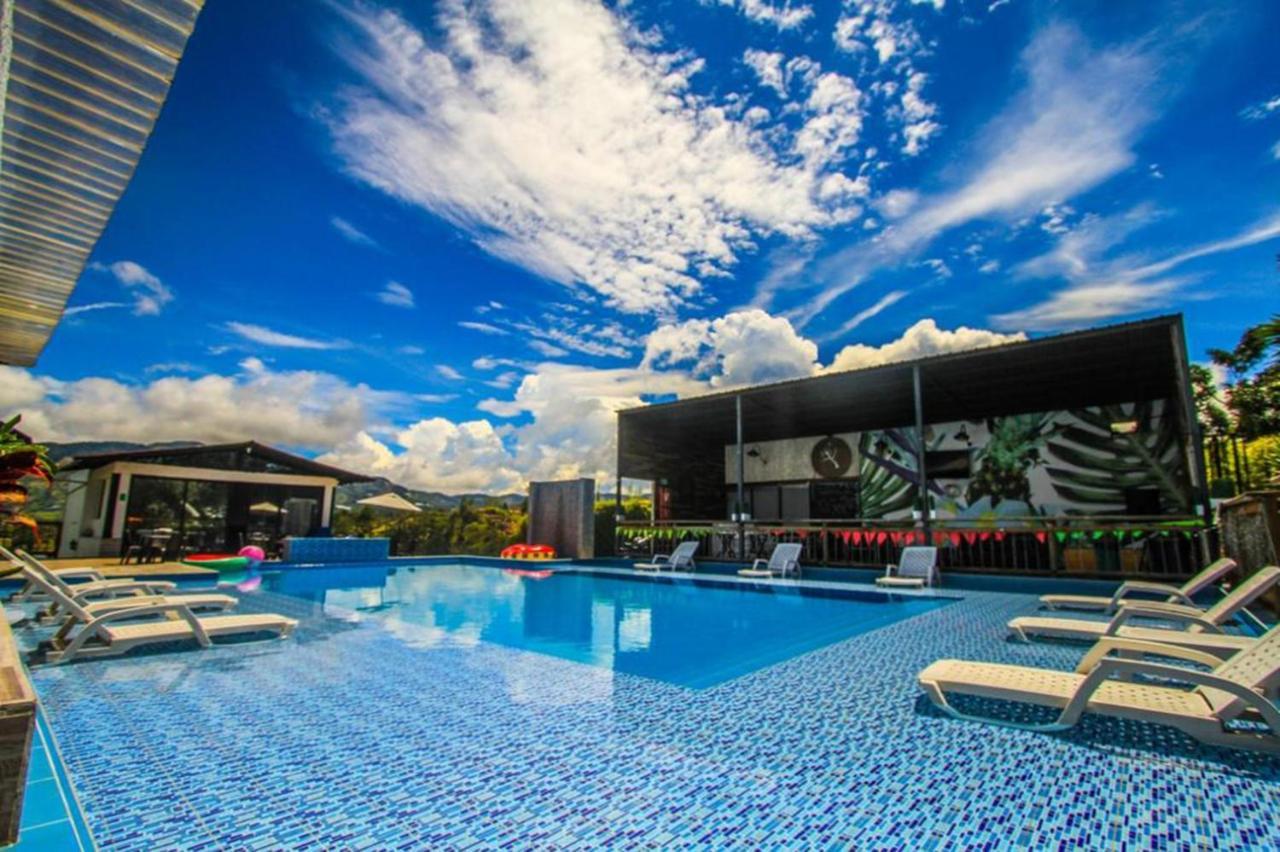 Happy Buddha Hostel & Lodge Guatape Bagian luar foto