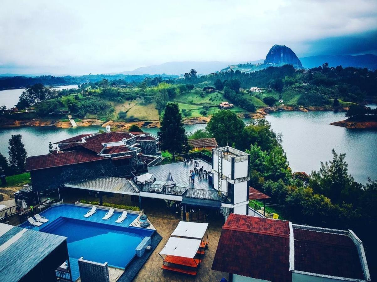 Happy Buddha Hostel & Lodge Guatape Bagian luar foto