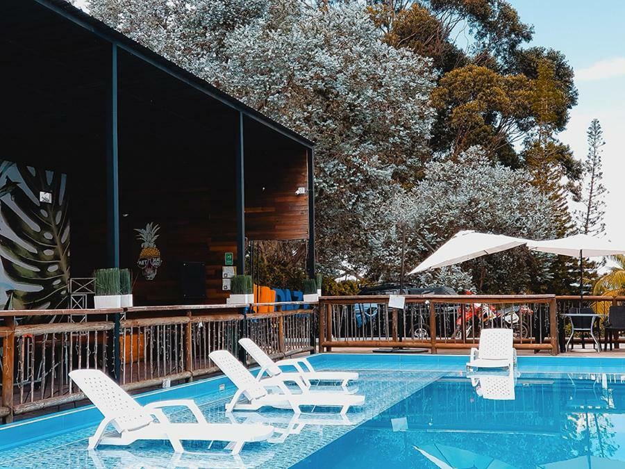 Happy Buddha Hostel & Lodge Guatape Bagian luar foto
