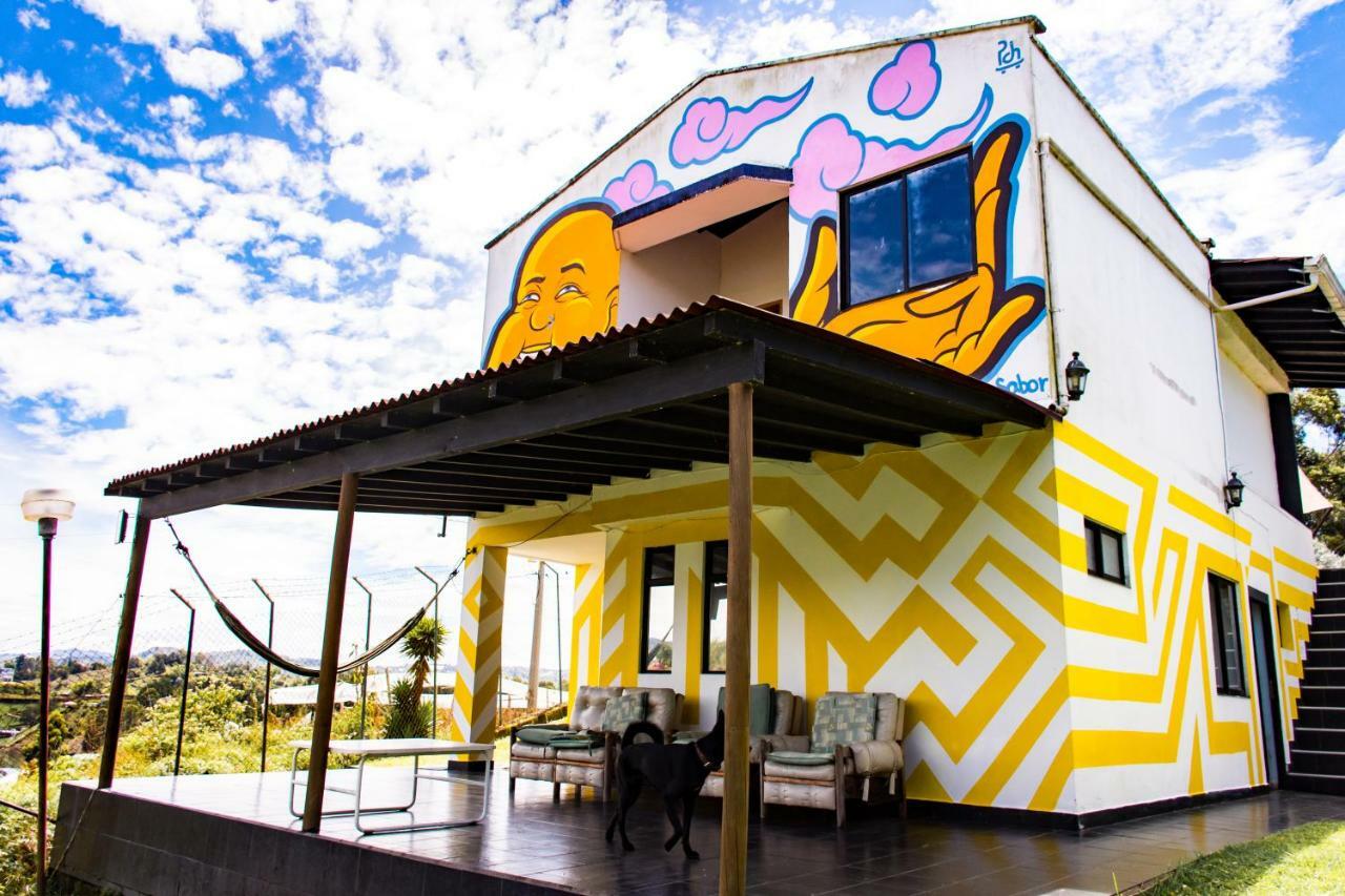 Happy Buddha Hostel & Lodge Guatape Bagian luar foto