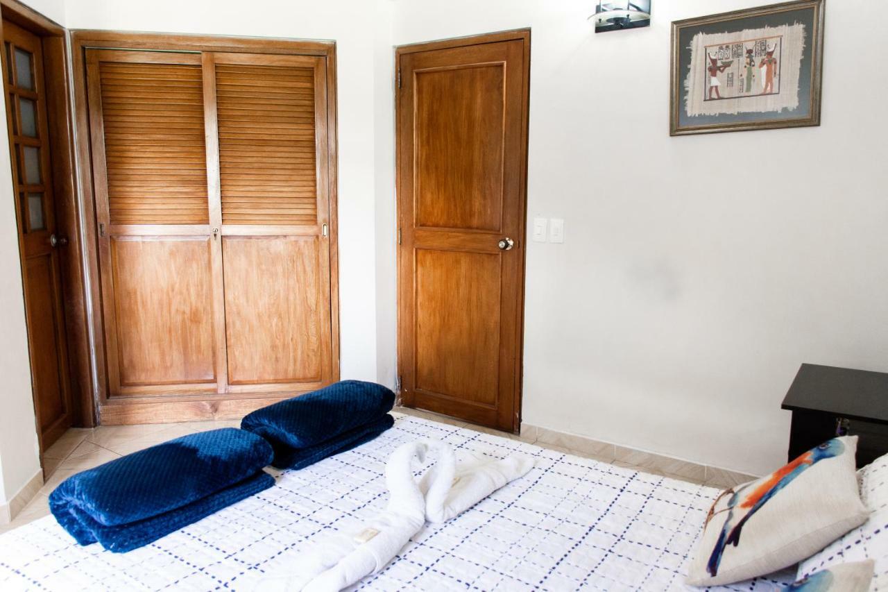 Happy Buddha Hostel & Lodge Guatape Bagian luar foto
