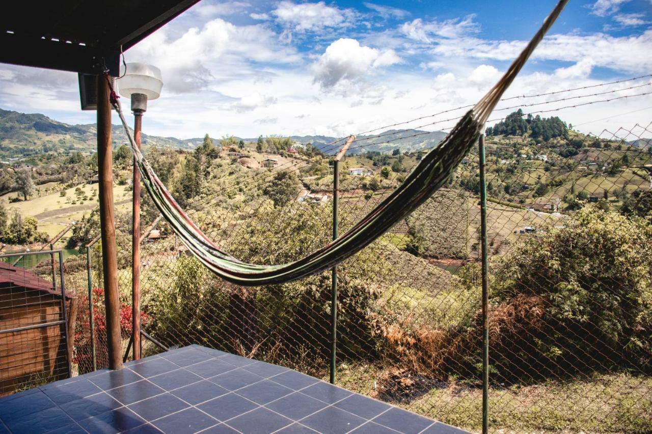 Happy Buddha Hostel & Lodge Guatape Bagian luar foto
