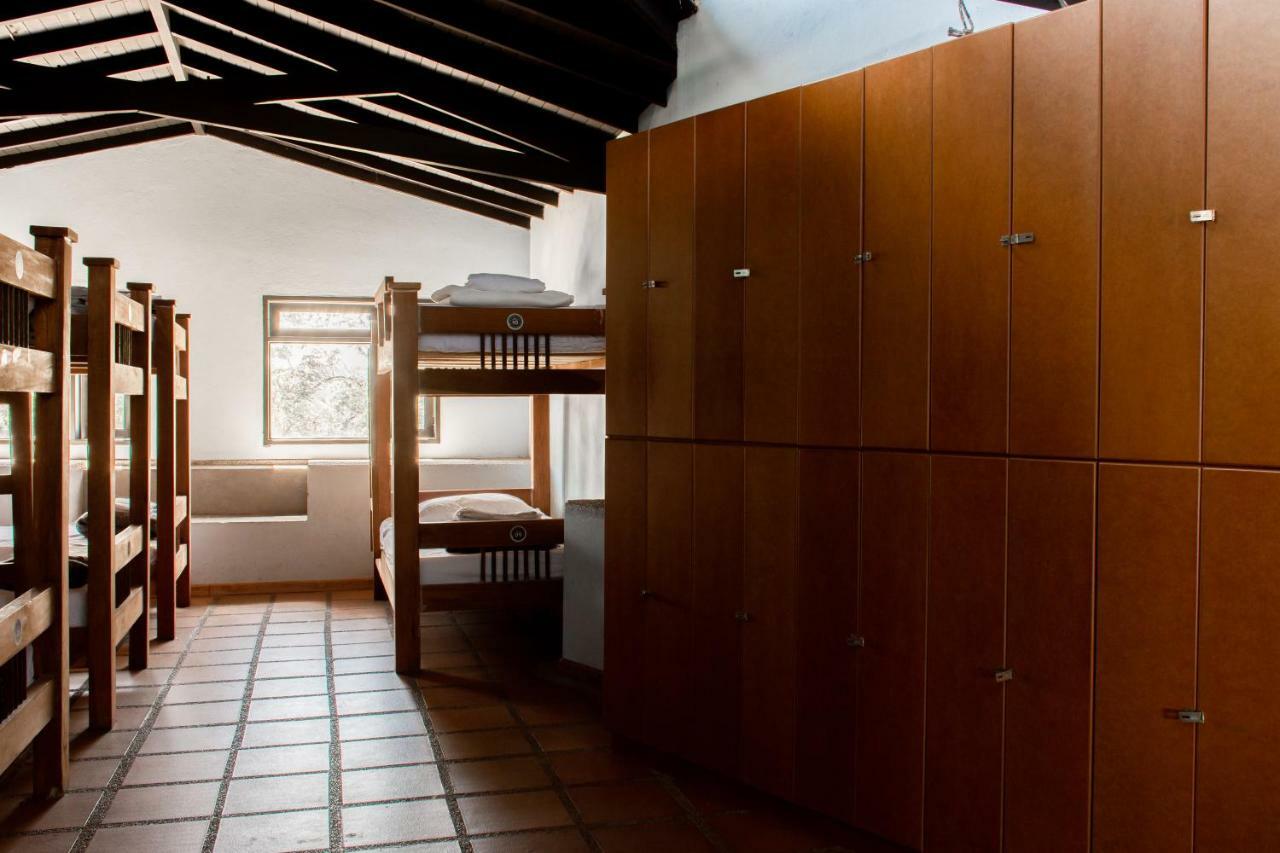 Happy Buddha Hostel & Lodge Guatape Bagian luar foto
