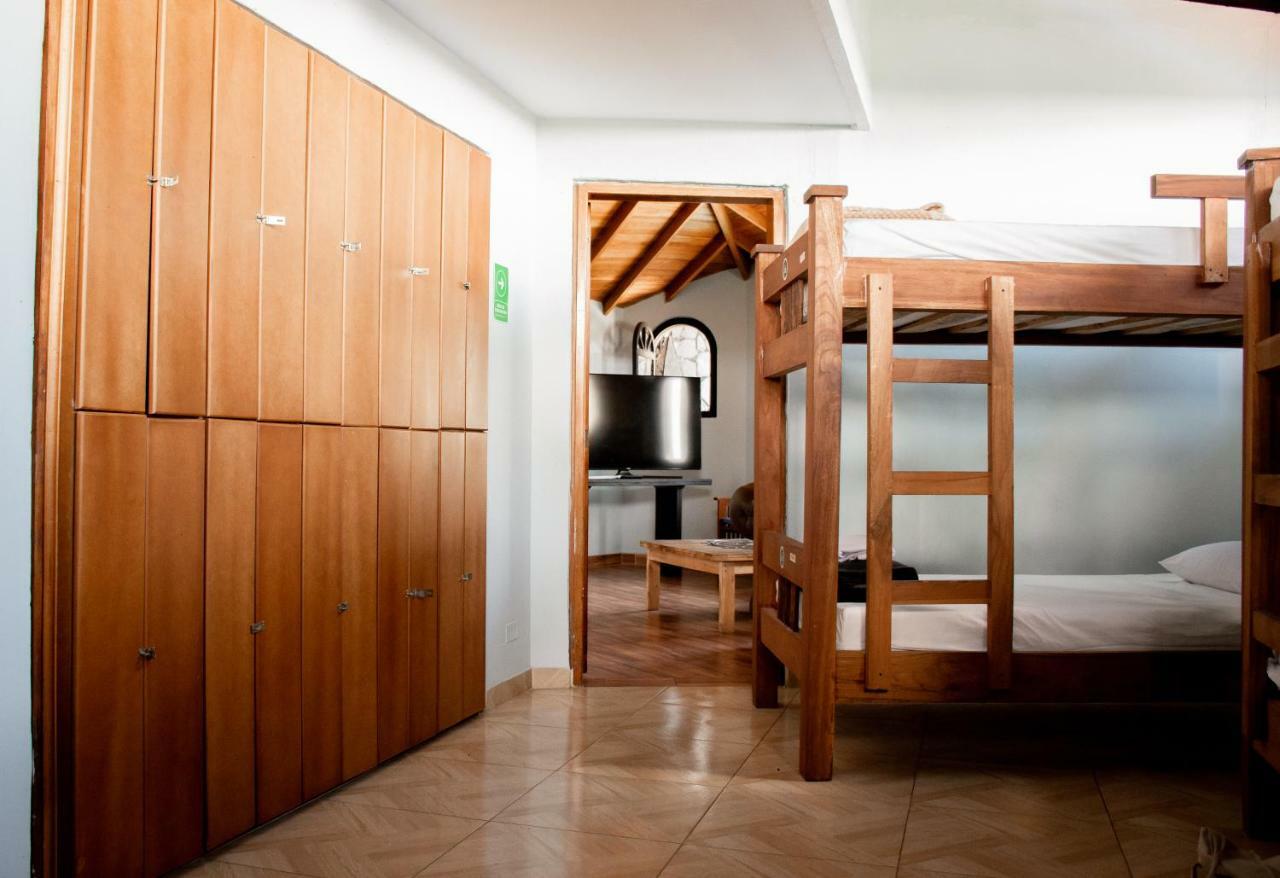 Happy Buddha Hostel & Lodge Guatape Bagian luar foto