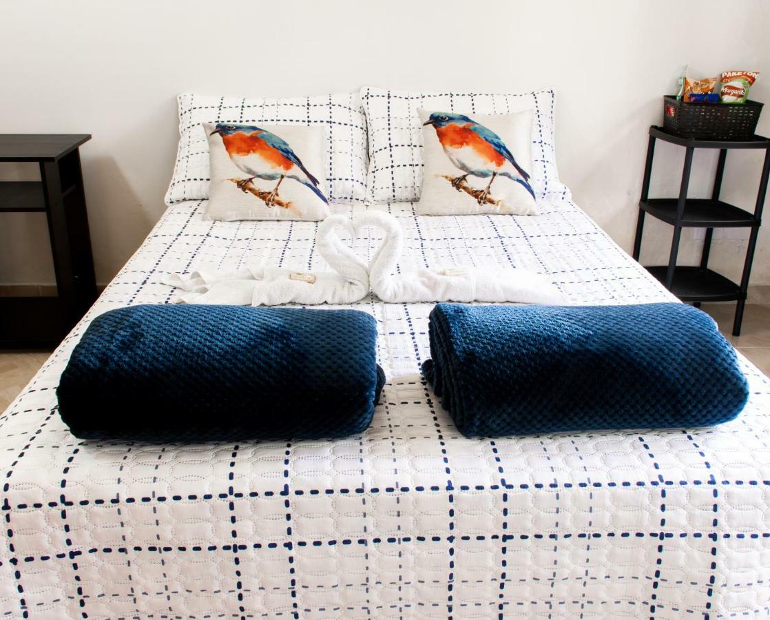 Happy Buddha Hostel & Lodge Guatape Bagian luar foto