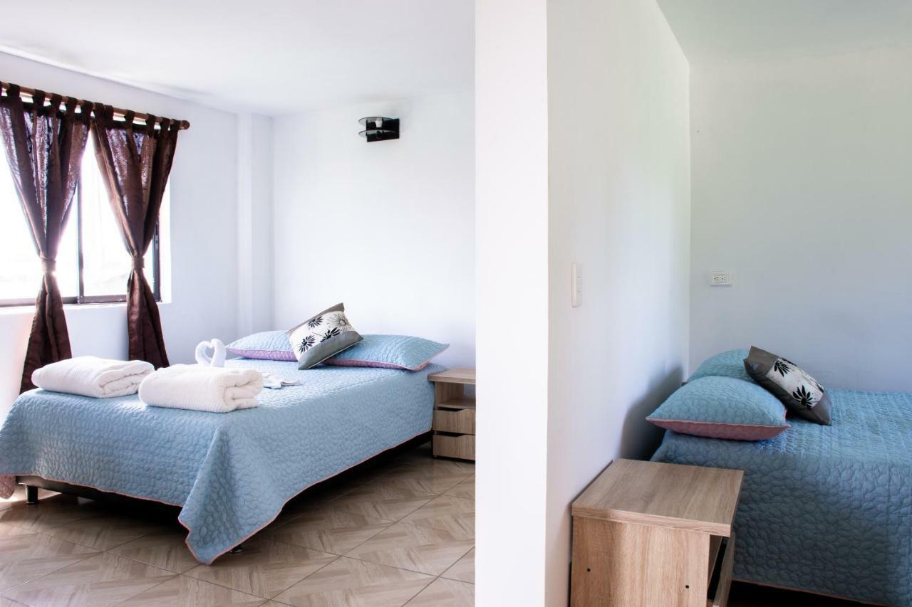 Happy Buddha Hostel & Lodge Guatape Bagian luar foto