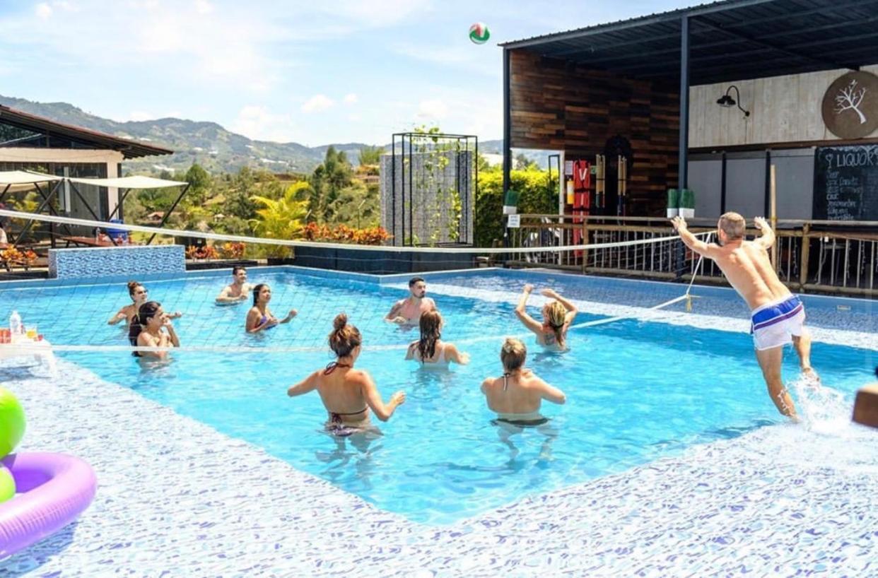 Happy Buddha Hostel & Lodge Guatape Bagian luar foto